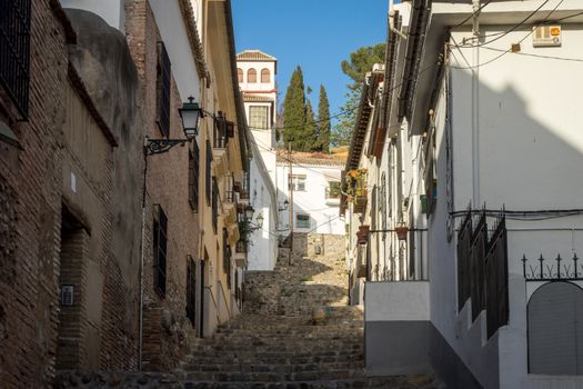 city center of Granada, Spain, Europe during golden hour of sunset on a bright sunny day