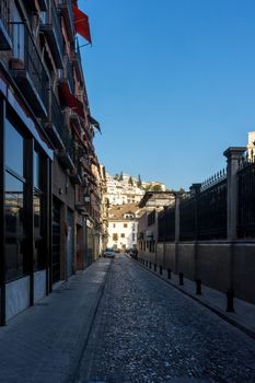 city center of Granada, Spain, Europe during golden hour of sunset on a bright sunny day