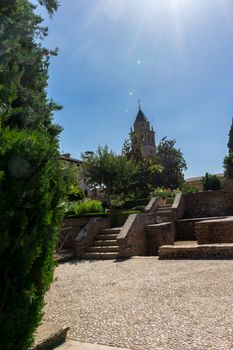 St. Mary Church of the Alhambra (Church of Santa Maria de la Alhambra) at the Alhambra Palace complex in Granada, Andalusia, Spain, Europe on a bright sunny day with blue sky