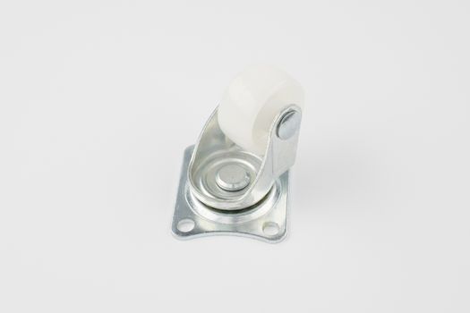 Industrial trolley swivel plastic caster wheel with top plate aluminium not fixed and break wheel place on white background.
