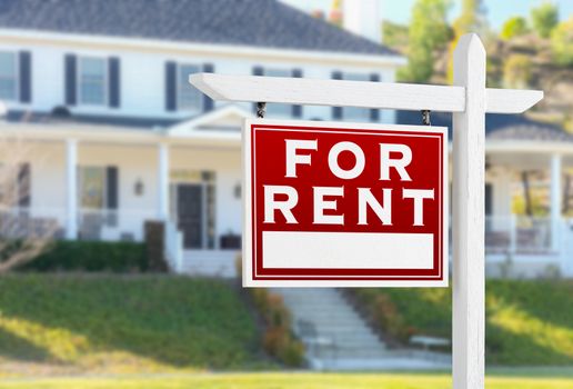 Left Facing For Rent Real Estate Sign In Front of House.