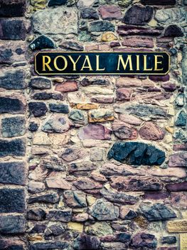 A Sign For The Famous Royal Mile On An Ancient Stone Wall In Edinburgh Scotland