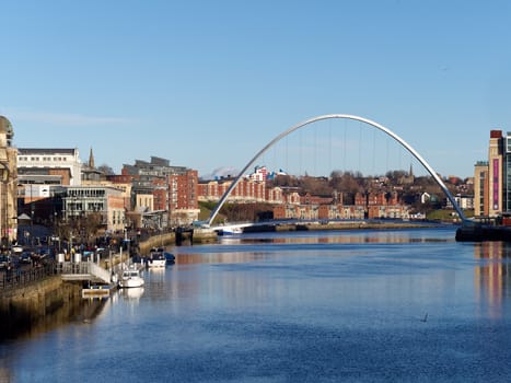 GATESHEAD, TYNE AND WEAR/UK - JANUARY 20 : View of the Millennium Bridge at dusk in Gateshead, Tyne and Wear on January 20, 2018. Unidentified people