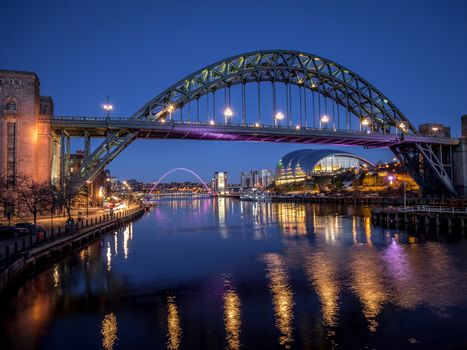 NEWCASTLE UPON TYNE, TYNE AND WEAR/UK - JANUARY 20 : View of the Tyne and Millennium Bridges at dusk in Newcastle upon Tyne, Tyne and Wear on January 20, 2018