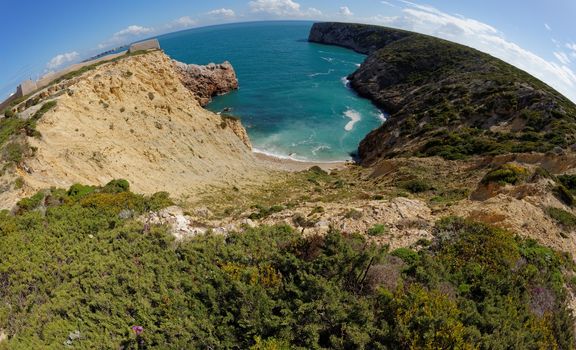 Fisheye view of ocean bay and Fortaleza de Belixe near Cabo de Sao Vicente Cape in the Algarve, Portugal