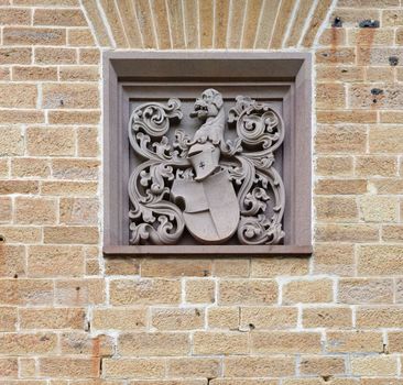 Coat of arms on the wall of Hohenzollern Castle in Germany