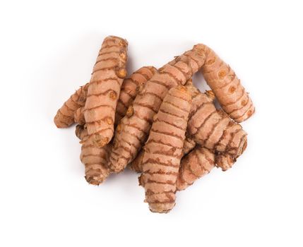 Turmeric root isolated on the white background.