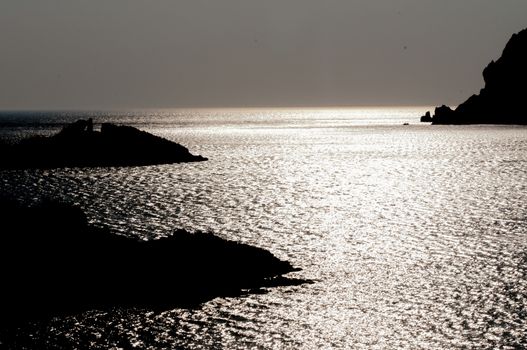 rocky silhouette in sea of patmos island