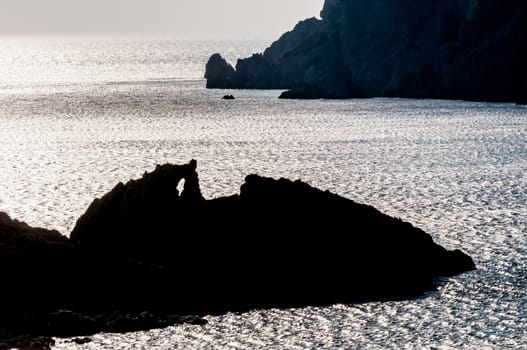 rocky silhouette in sea of patmos island