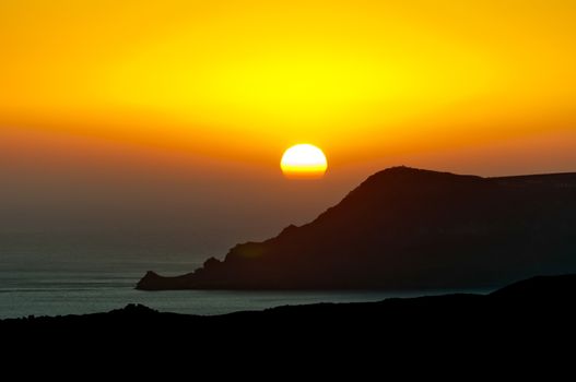beautiful sunset in mykonos island, greece