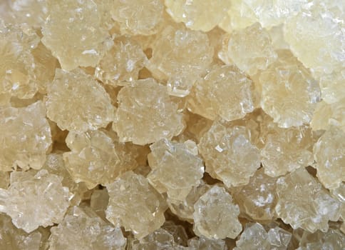 Rocky candy sugar at a market filling the frame