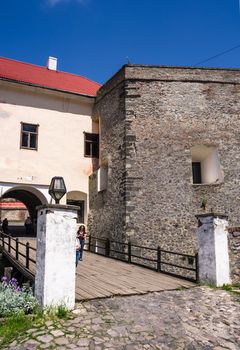 Mukachevo, Ukraine - MAY 25, 2008: entrance with bridge of the Palanok Castle. Old fortification now serves as the museum and is popular tourist landmark