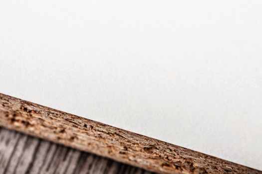 close-up of a straight cut white wooden board for furniture use