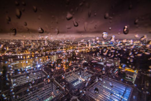 Paris city of lights at night when it's raining