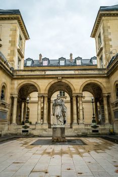 College de France hall statue in Paris