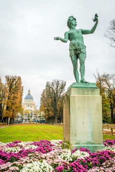 Pantheon and statue in Jardin du Luxembourg in Paris