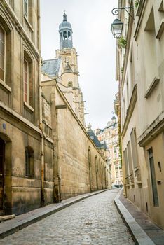 Paris quiet paved street and church in the 5th arrondissement district