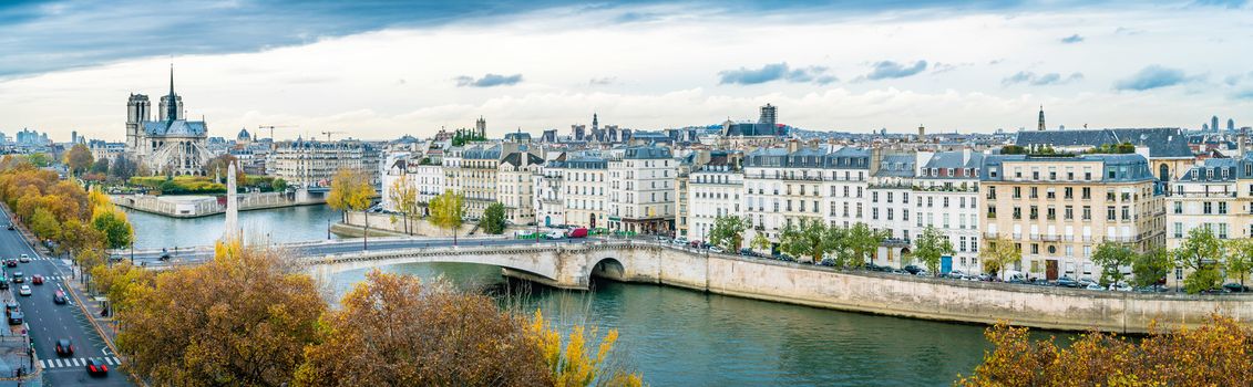 Panorama of Notre-dame-de-Paris and Seine river in Paris in autumn