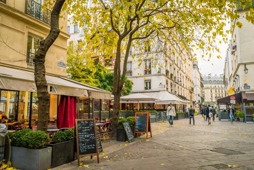 Paris street in Les Halles district with bars and restaurants