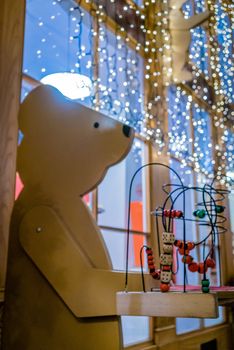 Antique bear wood toy in a shop for Christmas