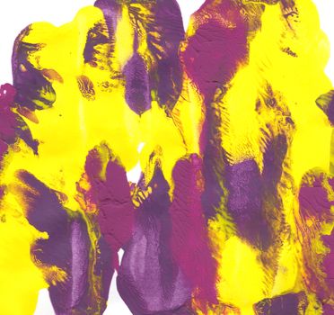 Abstract daubs of yellow, purple and magenta paint on white paper background