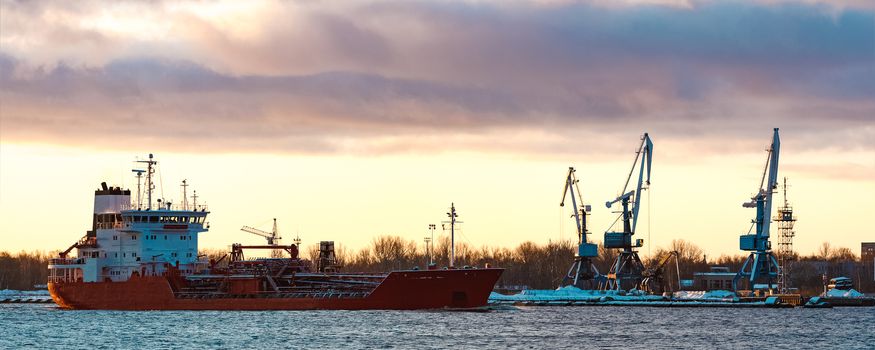 Red cargo oil tanker moving to Baltic sea
