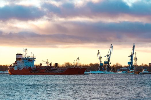 Red cargo oil tanker moving to Baltic sea