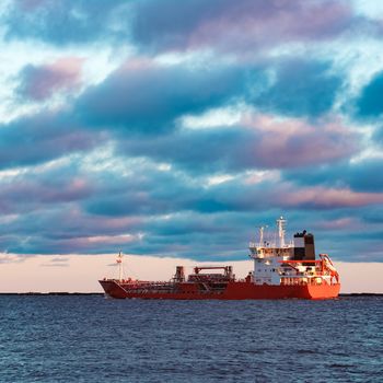 Red cargo oil tanker moving to Baltic sea