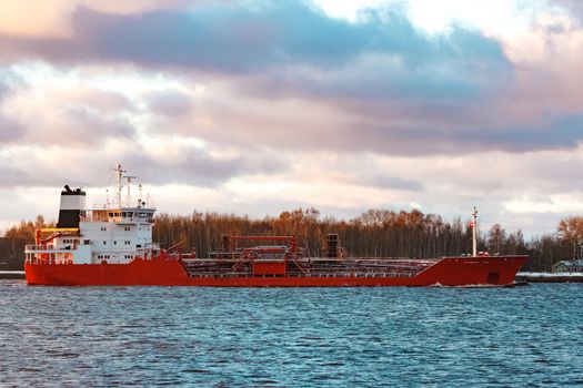 Red cargo oil tanker moving to Baltic sea