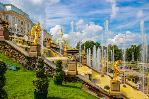 ST. PETERSBURG, RUSSIA - JULY 28, 2017: Grand cascade in Pertergof or Peterhof, known as Petrodvorets from 1944 to 1997. The Peterhof Palace included in the UNESCO's World Heritage List.