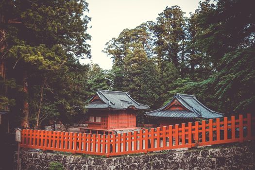 Traditional red wooden Shrine in Nikko, Japan