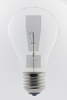 Photo of an old light bulb with an exclamation mark
