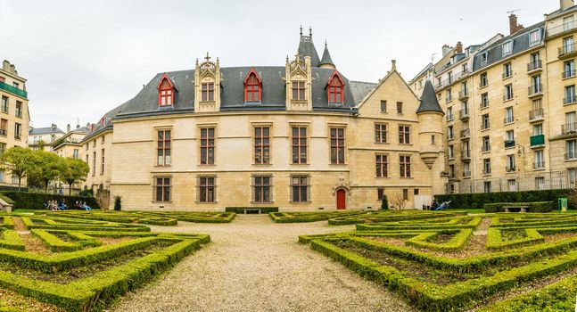 Garden of the Hotel des archeveques de Sens in Paris in autumn