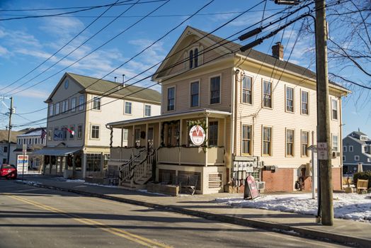 MYSTIC, CT - DECEMBER 17: cute buildings and shops downtown Mystic, on December 17, 2017 in Mystic, CT USA