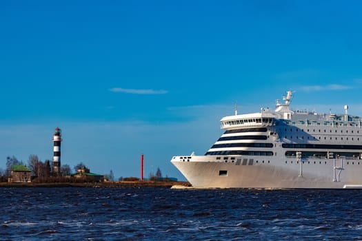 White cruise liner sailing on a clear day