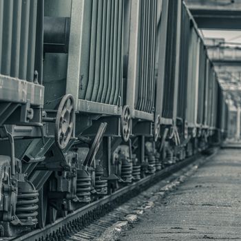 Green cargo wagons. Freight train in action