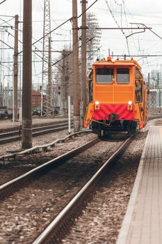 Ballast distributing and profiling track machine. Repair train