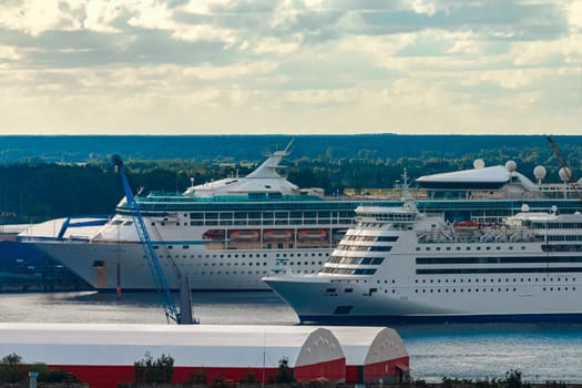 Two cruise liners in Riga. Tour travel and spa services