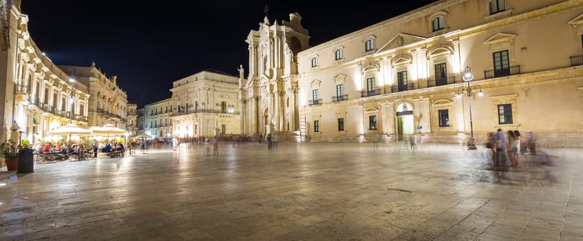 Travel Photography from Syracuse, Italy on the island of Sicily. Cathedral Plaza. Large open Square with summer nightlife.