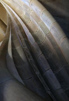 Spiral stone stair in old medieval tower, diminishing perspective, low angle view