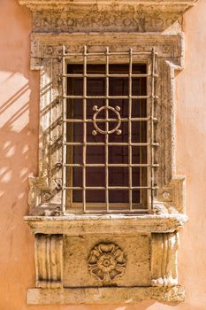 Assisi (Italy): Window on medieval stone wall