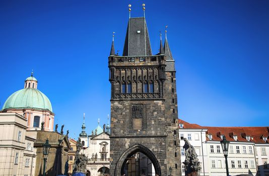 View of the Old Town Bridge Tower (Stare Mesto Tower) from the Charles Bridge (Karluv Most) in Prague, Czech Republic