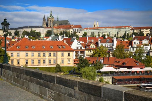 Panoramic view on St. Vitus Cathedral from Charles Bridge in Prague, Czech Republic
