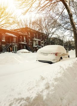 Urban winter street in sunset. Montreal, Quebec, Canada.