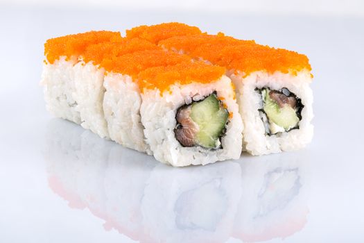 Roll the delicious sushi on a white background.