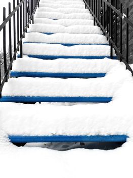 Townhouse staircase after snowstorm. Winter in Montreal, Quebec.