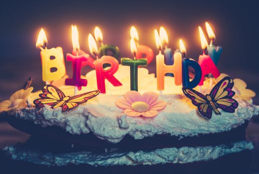 Retro Style Happy Birthday Candles On A Fresh Cream Cake