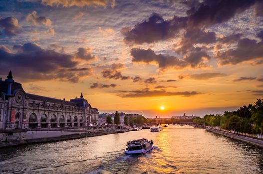 Sunset over Orsay Museum and Seine river in Paris