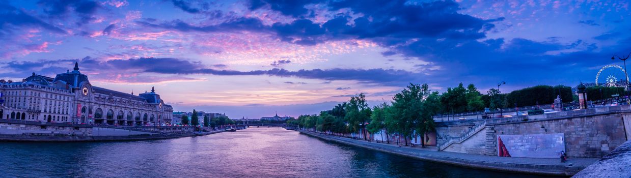 Panorama of Paris with Orsay Museum, Seine river and big wheel