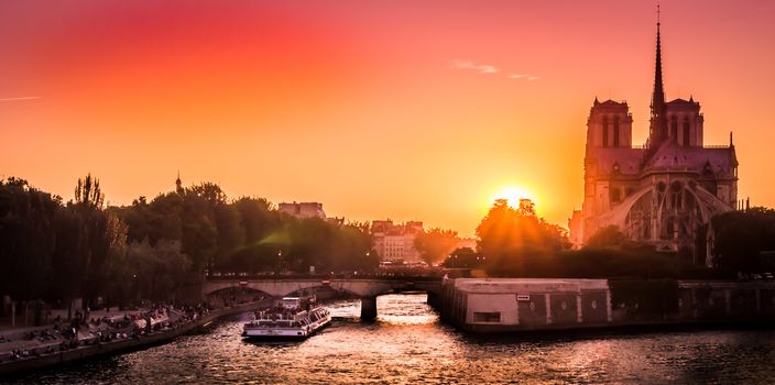 Red sunset over Paris and Notre Dame de Paris in the summer